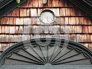 Historic cedar shake gable arch design with clock Lorenzo Mansion