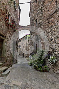 Anghiari`s Medieval Charm: Exploring the Rainy Streets of the Historic Center photo