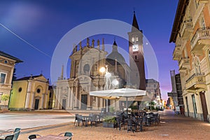 Historic center of an Italian city at dawn with outdoor bars, Busto Arsizio photo