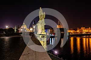 The historic center of Prague, the Charles Bridge night panorama.