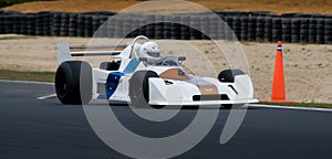 Historic Chevron F1 racing car at speed