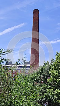 Historic Chimney in park, El Rastro, Madrid, Spain