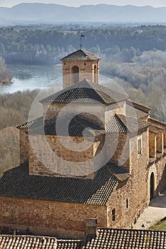 Historic church of Miravet and Ebro river. Tarragona. Catalunya, Spain photo