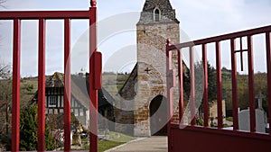 Historic church opening gate in Guerquesalles France