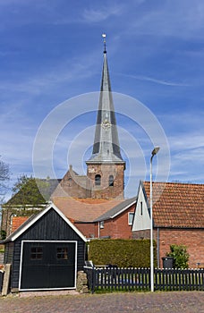 Historic church of the small town of Holwerd in Friesland