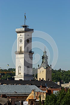 The historic city center of Lviv, old houses in the old town, Tower of City Hall on the Market Square. Lvov, Ukraine
