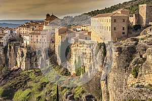 Historic city of Cuenca perched on the cliffs of the Huecar river gorge. Spain photo