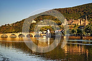 The historic city of Heidelberg with the castle, the Old Bridge, river Neckar and the Bridge Gate. Germany