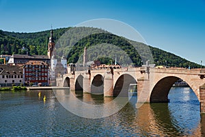 The historic city of Heidelberg with the Old Bridge, river Neckar and the Bridge Gate. Germany