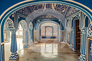 Historic City Palace Jaipur medieval architecture with decorative wall artwork at Rajasthan, India