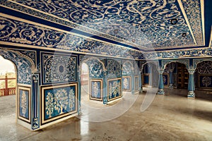 Historic City Palace Jaipur medieval architecture with decorative wall artwork at Rajasthan, India