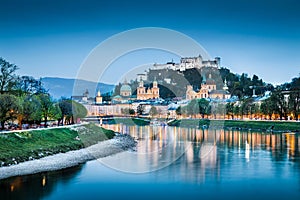 Historic city of Salzburg with Festung Hohensalzburg at dusk