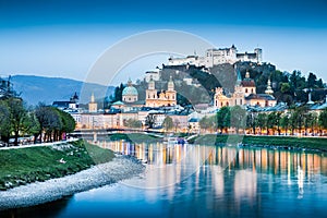 Historic city of Salzburg with Festung Hohensalzburg at dusk