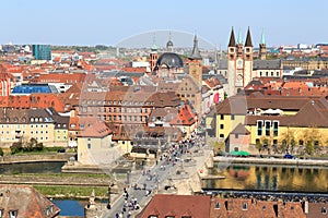 Historic city of Wurzburg with bridge Alte Mainbrucke, Germany photo