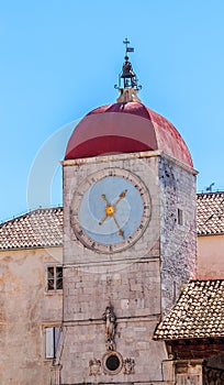 Clock tower of st Sebastian church in Trogir - Croatia