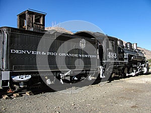 Historic Denver and Rio Grande Western steam locomotive and coal tender at Silverton, Colorado Railroad station