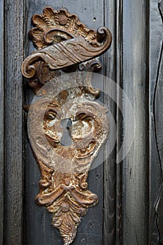 An historic doorhandles on the door of an old church in Krems, Lower Austria