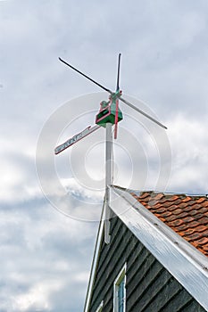 Historic Dutch Windmill in Zaanse Schans on the Zaan River in the Netherlands