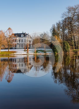 Historic estate reflected in the water
