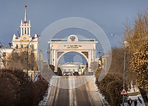 The historic gate in Ulan-Ude, Russia, with the engraved old name of the city town Verkhneudinsk.