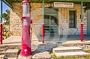 Historic general store building with antiqu gas pump in Driftwood, Texas