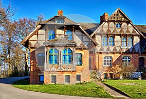 Historic German half-timbered house with old wooden windows.