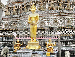 Historic golden Buddha statue in Wat Arun, Bangkok, Thailand