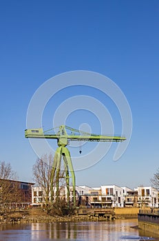 Historic green crane at the Geeste river in Bremerhaven