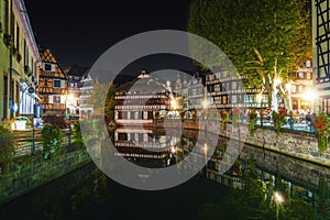 Historic half-timbered houses in tanners quarter in district la petite france in Strasbourg at night