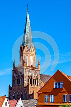 Historic Holy Mary gothic Kosciol Mariacki church in old town quarter of Trzebiatow in Poland