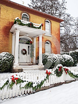 Historic home with Christmas decorations