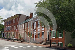 Streetview of a row of renovated historic homes photo