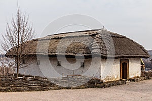 Historic house in the national reserve `Zaporizhzhia Sich` on the island of Khortytsia in Zaporizhzhia. Ukraine photo