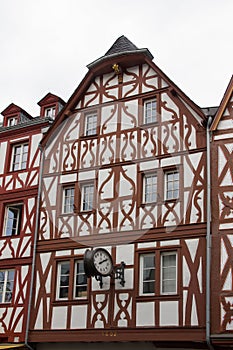 Historic house with nostalgic clock, trier