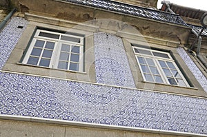 Historic Houses facade from Rua de Mouzinho da Silveira Street in Downtown of Porto in Portugal photo