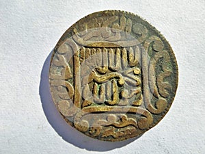 Historic Islamic Token [coin] with shadow on white