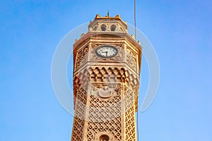 Historic izmir clock tower against clear blue sky