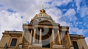 Historic Les Invalides cathedral in Paris, France, tomb of Napoleon Bonaparte, with the golden cupola.