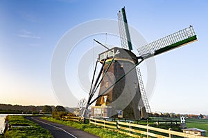 The historic Lisserpoel windmill along the river the Ringvaart