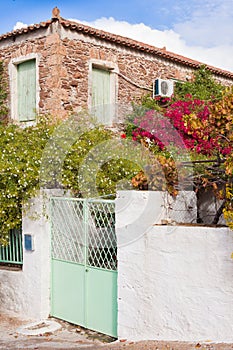 Historic mediterranean home with flower garden