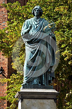 A historic monument to the astronomer Nicolaus Copernicus on the market square in the city of Torun