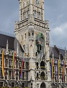 The historic Munich town hall at the Marienplatz decorated with rainbow flags for the Christopher Street Day CSD event, Germany