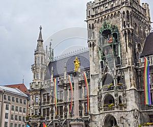 The historic Munich town hall at the Marienplatz decorated with rainbow flags for the Christopher Street Day CSD event, Germany