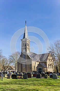 Historic Nicolaaskerk church and graveyard of Hemelem