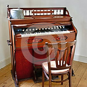Historic old house organ from the last century in beautiful mahogany design