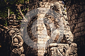 Historic old stone sculpture. Statue in front of an ancient hindu temple on Bali. 2022