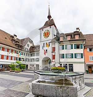 Historic old town of Willisau in canton Lucerne with city gate and fountain