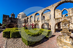 The Historic Old West Spanish Mission San Jose, Founded in 1720, San Antonio, Texas, USA. Showing dome, bell tower, and cross in photo