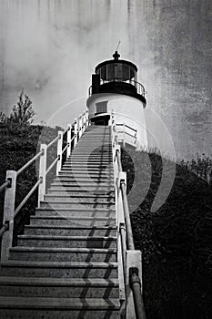 Historic Owls Head Lighthouse on the Coast of Maine in antique Black and white