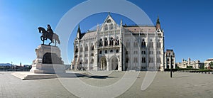 Historic parliament building with statue of Gyul AndrÃÂ¡ssa in Budapest photo